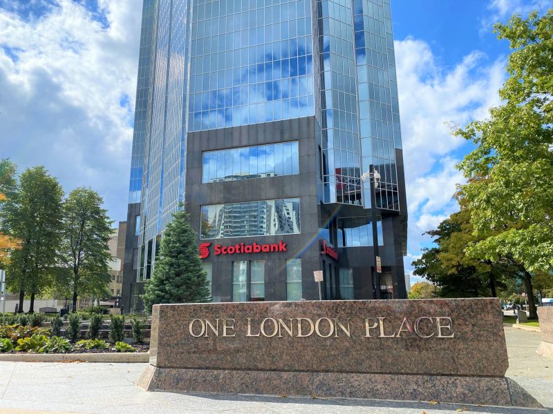 Exterior of One London Place, featuring the One London Place stone